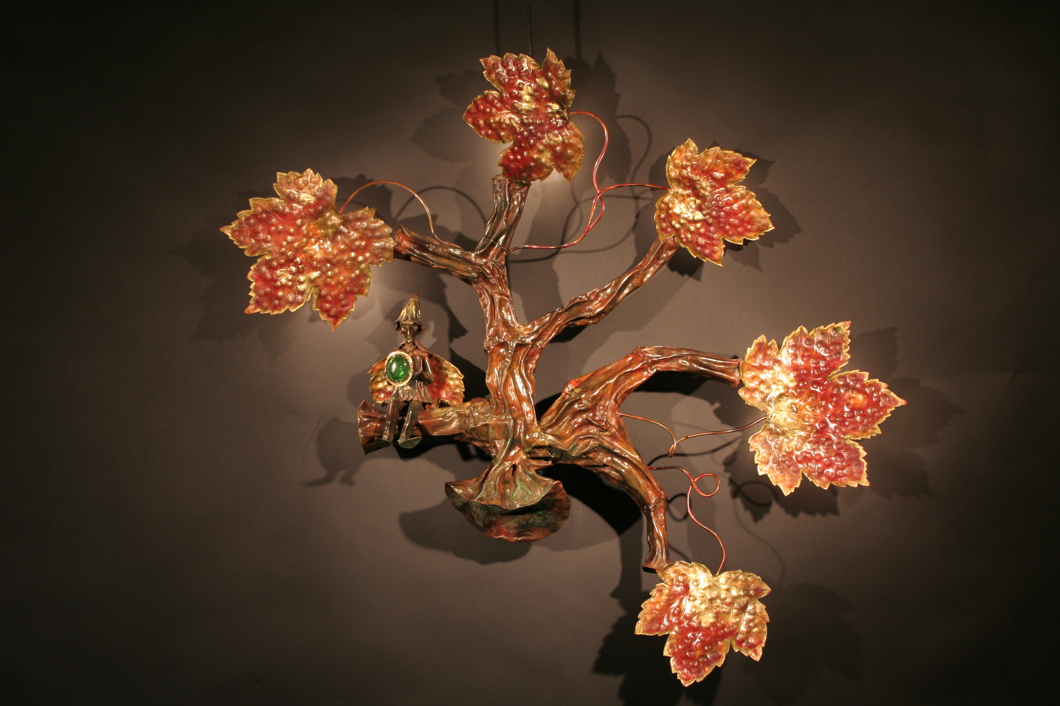 Applique murale (luminaire) en cuivre patiné.